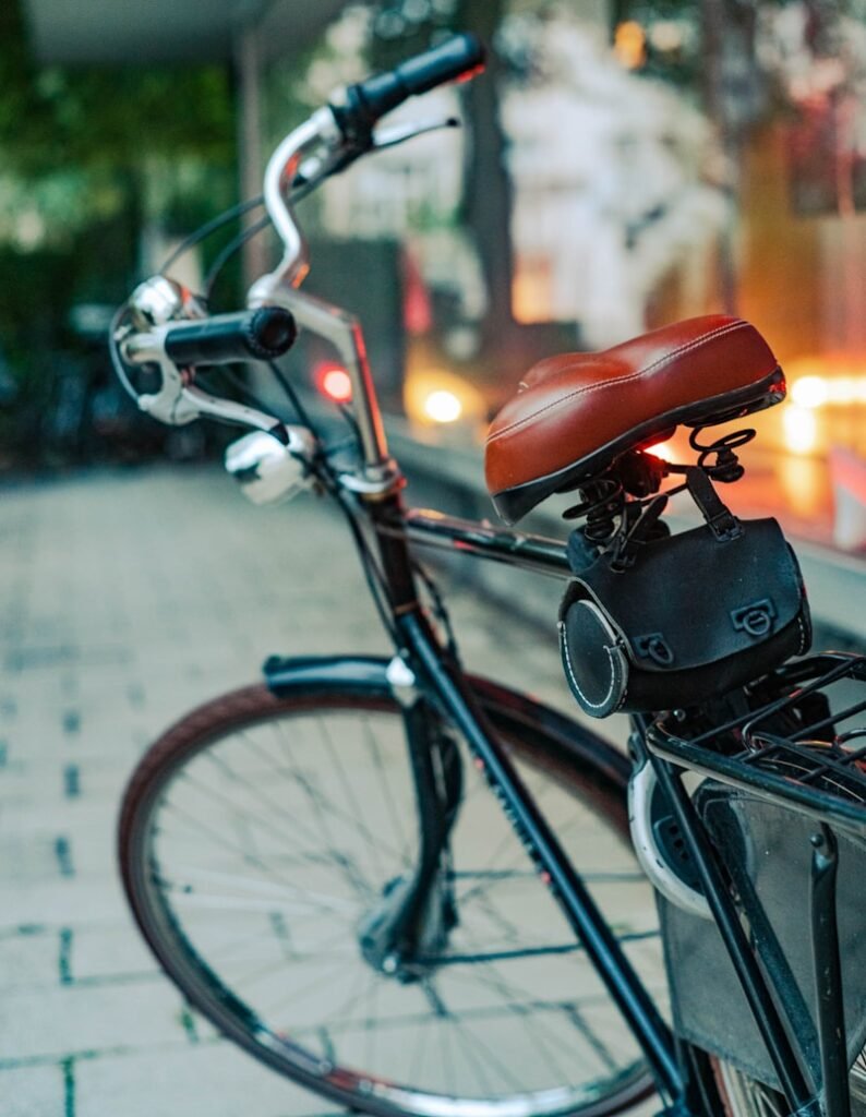 a bicycle parked on a sidewalk